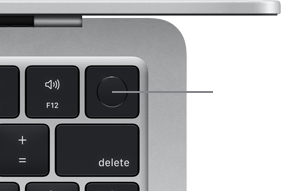 Prawy górny róg klawiatury MacBooka Air w kolorze srebrnym z wyraźnie widocznym przyciskiem Touch ID