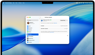 Ekran 16-calowego MacBooka Pro z czipem M4 z widoczną zaplanowaną aktualizacją oprogramowania w ustawieniach systemowych