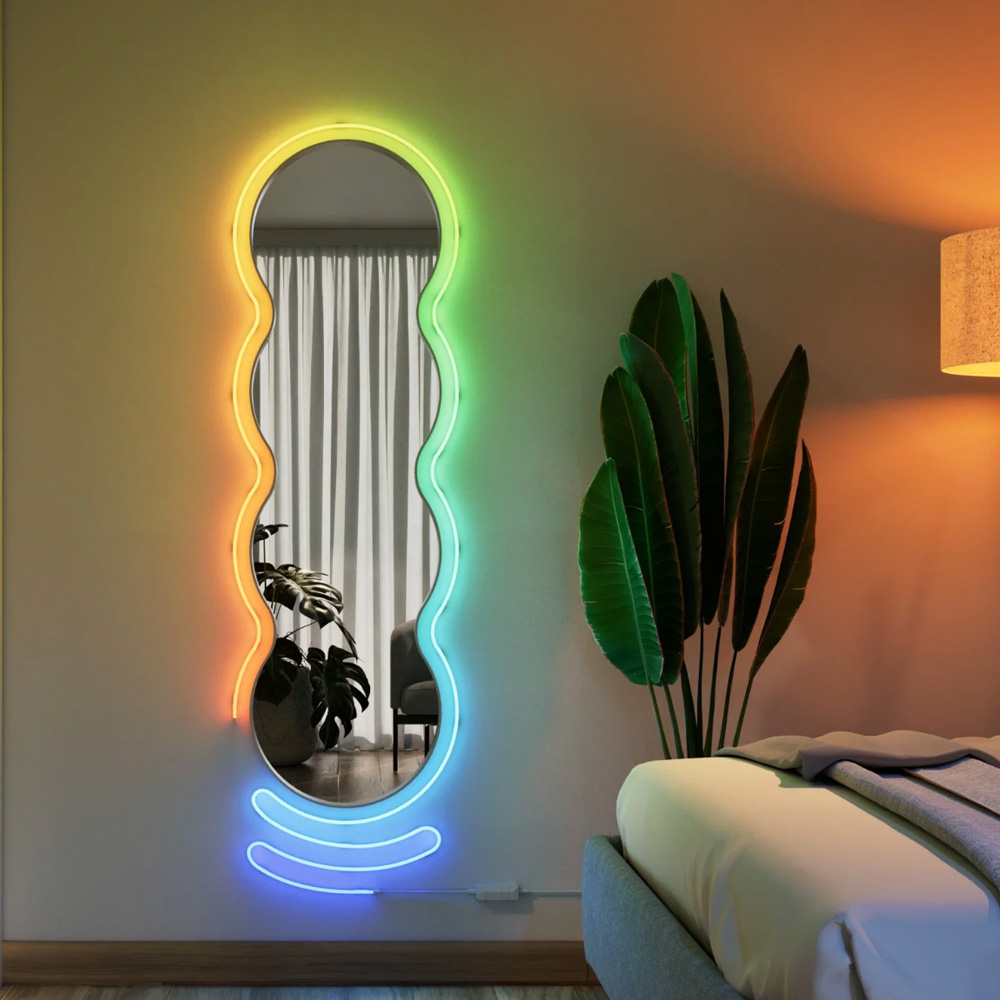 Listwa Nanoleaf Smart Multicolour Rope Light zamocowana na ścianie wokół lustra