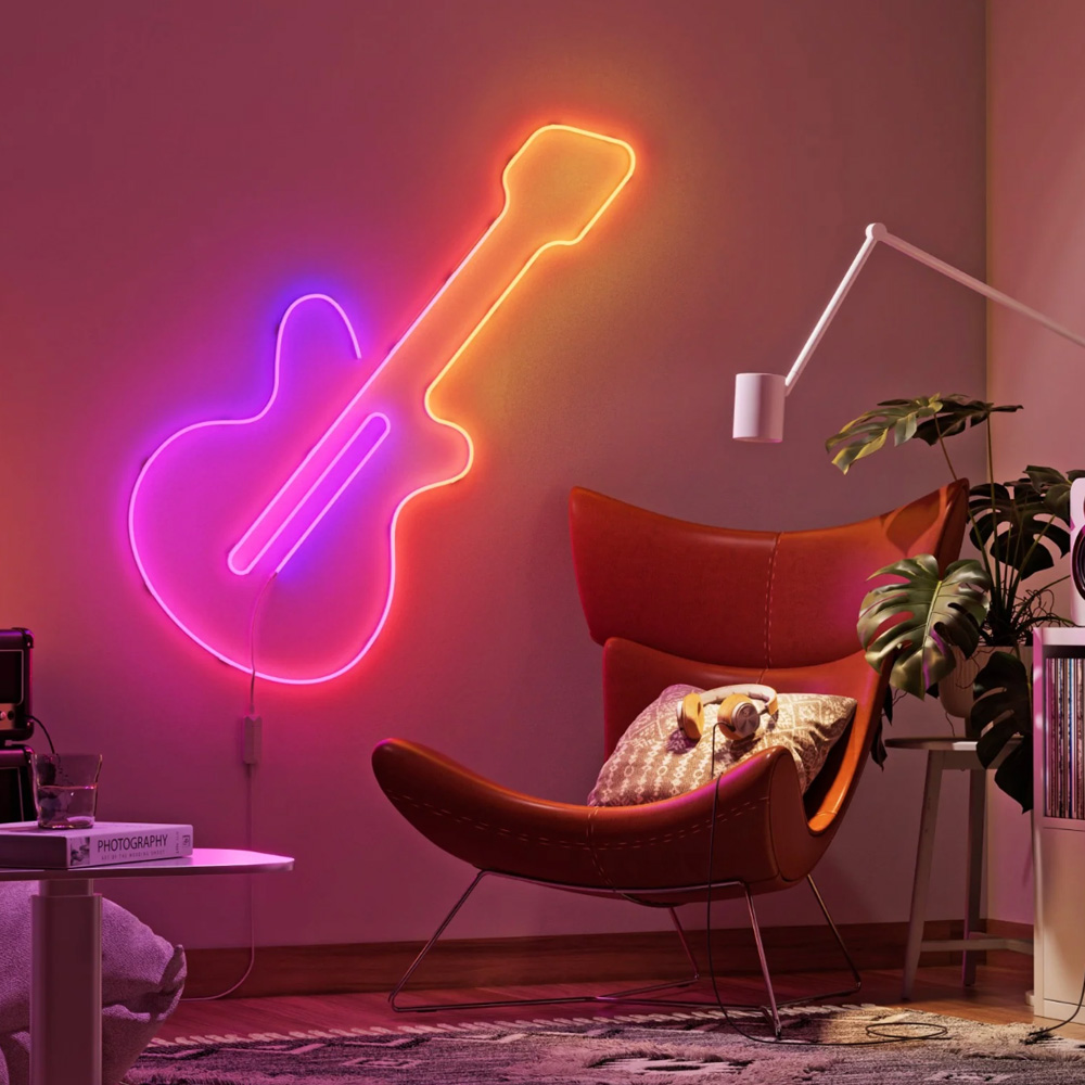 Listwa Nanoleaf Smart Multicolour Rope Light odtwarza kształt gitary na ścianie