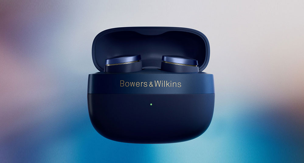 Zdjęcie słuchawek Pi8 w etui ładującym.