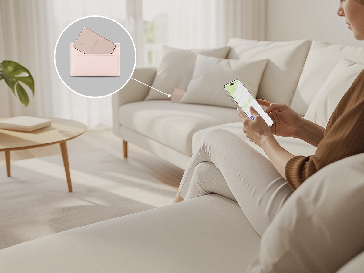 Użytkownik używa lokalizatora Satechi FindAll Wallet Card do ustalenia miejsca pozostawienia portfela.