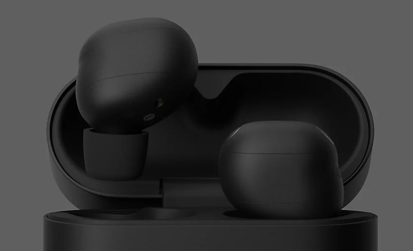 Sony WF-1000XM6 Słuchawki w etui z uchyloną pokrywą.