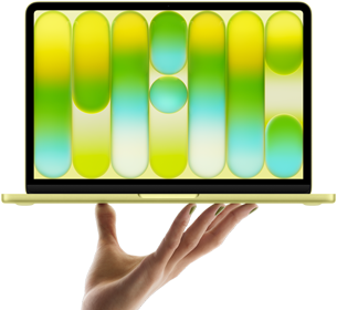MacBook Neo w kolorze cytrusowożółtym, leżący na palcach otwartej dłoni, na ekranie widać kolorowy abstrakcyjny wzór