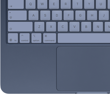 Widok z góry na MacBooka Neo w kolorze indygo z dopasowanymi kolorystycznie klawiszami i gładzikiem Multi‑Touch