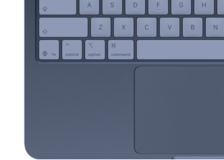 Widok z góry na MacBooka Neo w kolorze indygo z dopasowanymi kolorystycznie klawiszami i gładzikiem Multi‑Touch