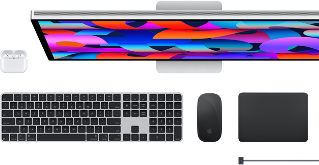 Akcesoria do Maca: AirPods, monitor Studio Display, klawiatura Magic Keyboard, mysz Magic Mouse w kolorze gwiezdnej czerni, gładzik Magic Trackpad w kolorze gwiezdnej czerni, przewód do ładowania MagSafe w kolorze gwiezdnej czerni